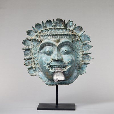 Lot 137 - BRONZE MASK INDIA 16TH CENTURY WITH SILVER TONG