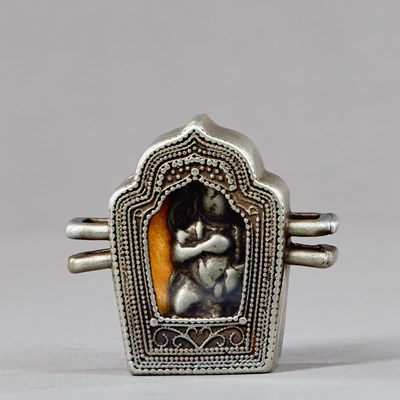 Lot 438 - SILVER AND COPPER GAU WITH JAMBHALA INSIDE, TIBET 18TH CENTUY