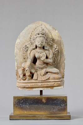 Lot 57 - SEATED GREEN TARA STONE NEPAL 18TH CENTURY