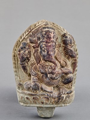 Lot 371 - SEATED STONE GANESHA NEPAL 18TH CENTURY