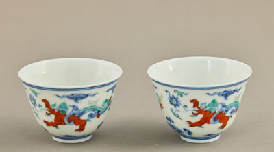 Lot 228 - PAIR OF DOUCAI ‘DRAGON’ CUPS , CHINA CHENGHUA MARK AND PERIOD (1465-1487)