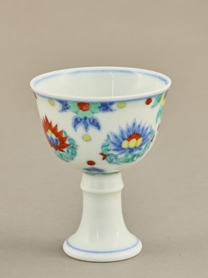 Lot 301 - DOUCAI STEM CUP WITH LOTUS BLOSSOMS, CHENGHUA PERIOD OF THE MING DYNASTY