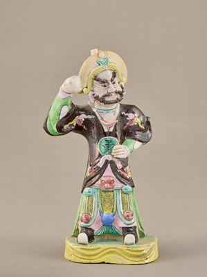 Lot 218 - YONGZHENG-STYLE FAMILLE ROSE PORCELAIN FIGURE OF A FOREIGN TRIBUTE BEARER