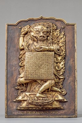 Lot 223 - GILT COPPER REPOUSSE PLAQUE DEPICTING SIMHAMUKHA, TIBET, 16TH CENTURY