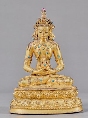Lot 398 - EXCEPTIONALLY FINE GILT BRONZE FIGURE OF AMITAYUS WITH TURQUOISE , TIBET, 15TH CENTURY