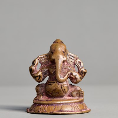 Lot 363 - SEATED GANESHA, CAST BRONZE WITH TRACES OF POLYCHROMY, NEPAL, 15TH–16TH CENTURY